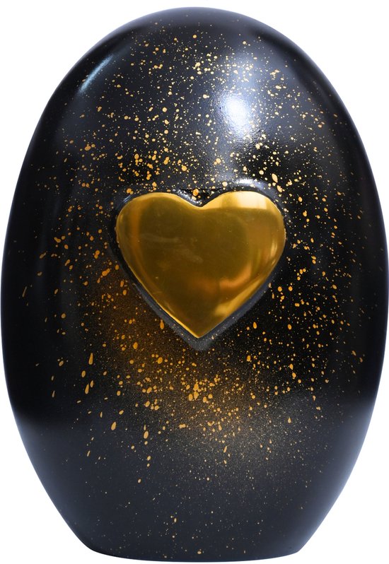 Zwarte ei-vormige urn met een gouden hart en gouden spetters.