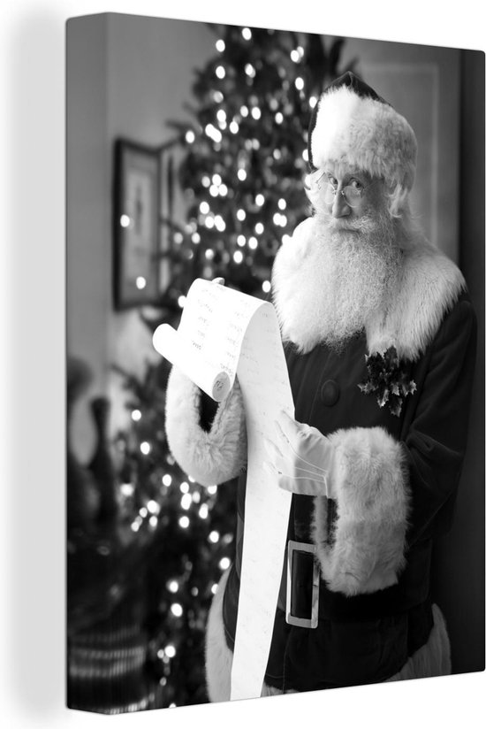 Canvas Schilderij De leeslijst van de kerstman met op de achtergrond een kerstboom - zwart wit - 30x40 cm - Wanddecoratie
