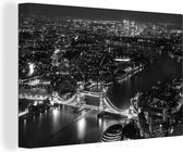 Canvas schilderij 140x90 cm - Wanddecoratie Luchtfoto van Londen met centraal de Tower Bridge in de nacht - zwart wit - Muurdecoratie woonkamer - Slaapkamer decoratie - Kamer accessoires - Schilderijen