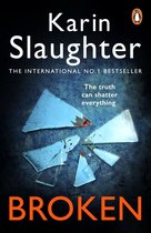 Boekomslag van 'Broken' door Karin Slaughter met blauwe glasscherven en bloedvlekken op een donkere achtergrond.