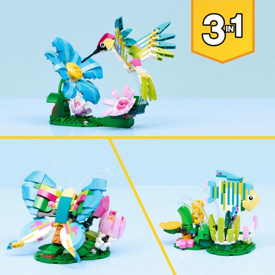 Set LEGO Creator 3-en-1 avec un colibri, un papillon et un poisson, tous faits de briques LEGO colorées.