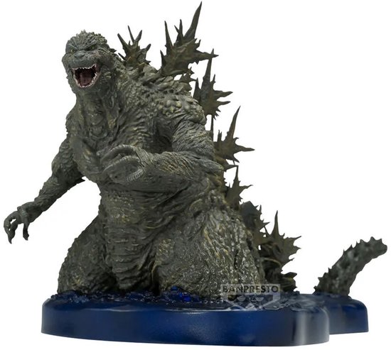 Grijze Godzilla figuur met scherpe rugplaten, knielend op een blauwe waterbasis.