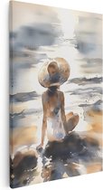 Artaza Canvas Schilderij Vrouw Zittend op het Strand met een Strohoed - 60x90 - Muurdecoratie - Foto Op Canvas - Canvas Print