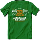 33 Jaar Legend T-Shirt | Goud - Wit | Grappig Verjaardag en Feest Cadeau Shirt | Dames - Heren - Unisex | Tshirt Kleding Kado | - Donker Groen - XL