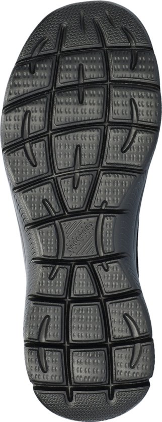 Zool van een zwarte Skechers Slip-Ins damesinstapper met rasterpatroon.