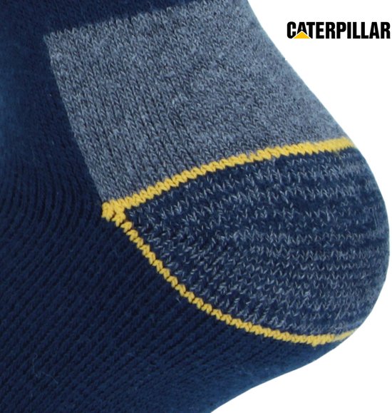 Detail van een blauwe Caterpillar werksok met grijze versteviging en gele rand.