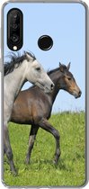 Geschikt voor Huawei P30 Lite hoesje - Paarden - Dieren - Gras - Siliconen Telefoonhoesje