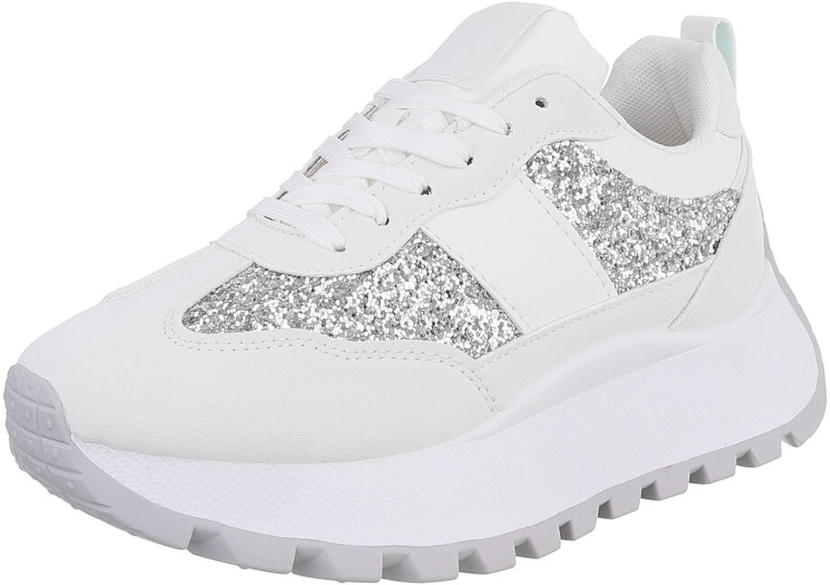 Sneaker - vetersluiting en grof profiel - dames Mt:36