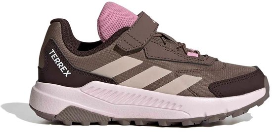 Bruine kinderschoen met roze accenten, beige strepen en klittenbandsluiting.