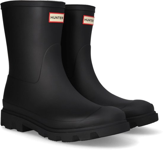 Paar zwarte Hunter korte regenlaarzen met rode Hunter logo's
