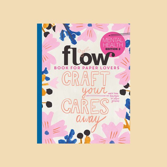Het "Flow Book for Paper Lovers" magazine, editie 2, met een bloemenomslag en de tekst 'Craft your cares away'.
