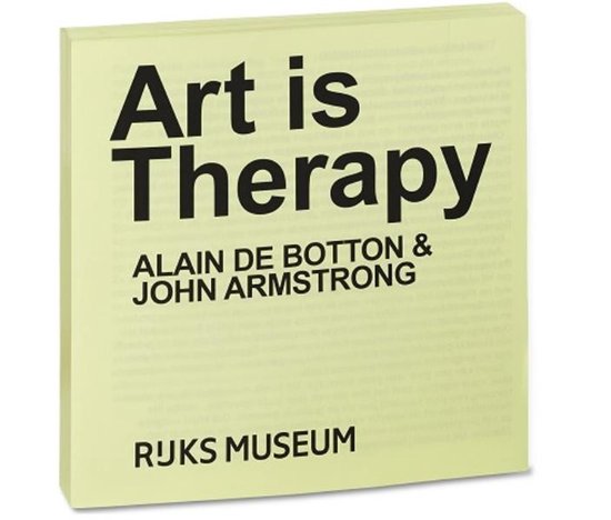 Lichtgele notitieblok met de tekst "Art is Therapy" in zwarte letters. Daaronder "ALAIN DE BOTTON & JOHN ARMSTRONG" en "RIJKS MUSEUM".
