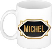 Naam cadeau mok / beker Michel met gouden embleem 300 ml