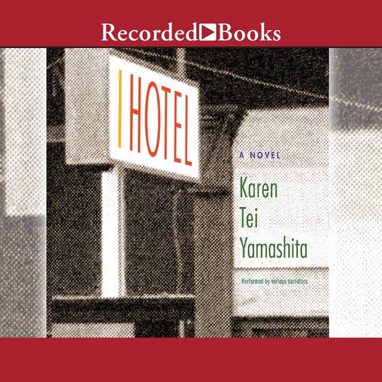 Livre 'I Hotel' de Karen Tei Yamashita. Avec une enseigne lumineuse 'HOTEL'.