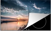 KitchenYeah® Inductie beschermer 91.2x52 cm - Zonsondergang in de haven van Harlingen in Friesland - Kookplaataccessoires - Afdekplaat voor kookplaat - Inductiebeschermer - Inductiemat - Inductieplaat mat