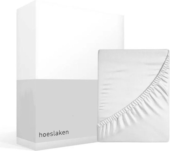 Drap housse blanc en emballage, avec bord élastique pour un bon ajustement.