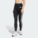 Vrouw in zwarte sportlegging met witte Adidas strepen op de zijkant en een Adidas logo op de heup.