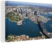 Canvas Schilderij Luchtfoto van Sydney en de Sydney Harbour Bridge in Australië - 90x60 cm - Wanddecoratie