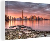 Canvas schilderij 180x120 cm - Wanddecoratie De stadshorizon van Toronto bij een zonsondergang in Noord-Amerika - Muurdecoratie woonkamer - Slaapkamer decoratie - Kamer accessoires - Schilderijen