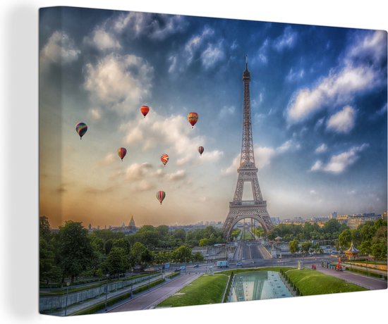 Canvas Schilderij De Eiffeltoren met op de achtergrond luchtballonnen die in de lucht varen boven Parijs - 120x80 cm - Wanddecoratie