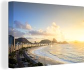 Canvas schilderij 140x90 cm - Wanddecoratie Copacabana tijdens zonsopgang - Muurdecoratie woonkamer - Slaapkamer decoratie - Kamer accessoires - Schilderijen