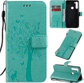 Voor Motorola Moto G8 Tree & Cat Pattern Pressed Printing Horizontale Flip PU Leather Case met houder & kaartsleuven & portemonnee & Lanyard (groen)