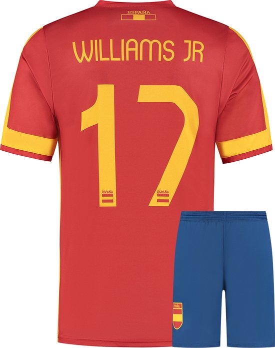 Set van rood voetbalshirt met 'WILLIAMS JR' en nummer '17' op de rug, en blauw voetbalbroekje met embleem.