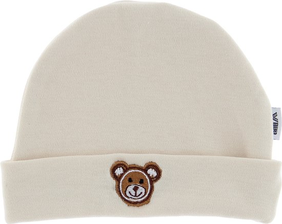 Off-white baby muts met een geborduurde bruine teddybeer op de omslag. Op de muts staat een VIB label.