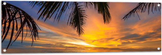 Tuinposter – Palmbladeren Hangend boven het Strand aan de Zee - 120x40 cm Foto op Tuinposter (wanddecoratie voor buiten en binnen)