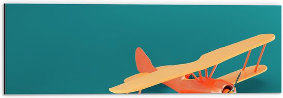 Dibond - Pasteloranje Zweefvliegtuig op Blauwe Achtergrond - 60x20 cm Foto op Aluminium (Met Ophangsysteem)