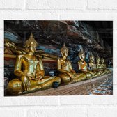 Muursticker - Rijen Gouden Boeddha's in Wat Tham Khuha Sawan Tempel in Thailand - 40x30 cm Foto op Muursticker