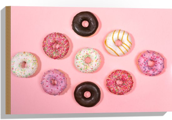 Hout - Verschillende Smaken Donuts op Pastelroze Achtergrond - 60x40 cm - 9 mm dik - Foto op Hout (Met Ophangsysteem)