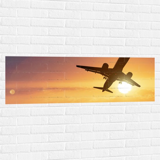Muursticker - Silhouet van Passagiersvliegtuig Vliegend langs de Zon - 120x40 cm Foto op Muursticker