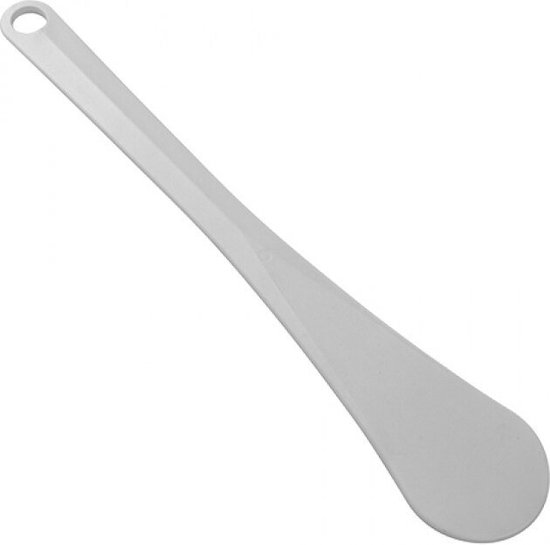 Longue spatule blanche avec un trou à l'extrémité.