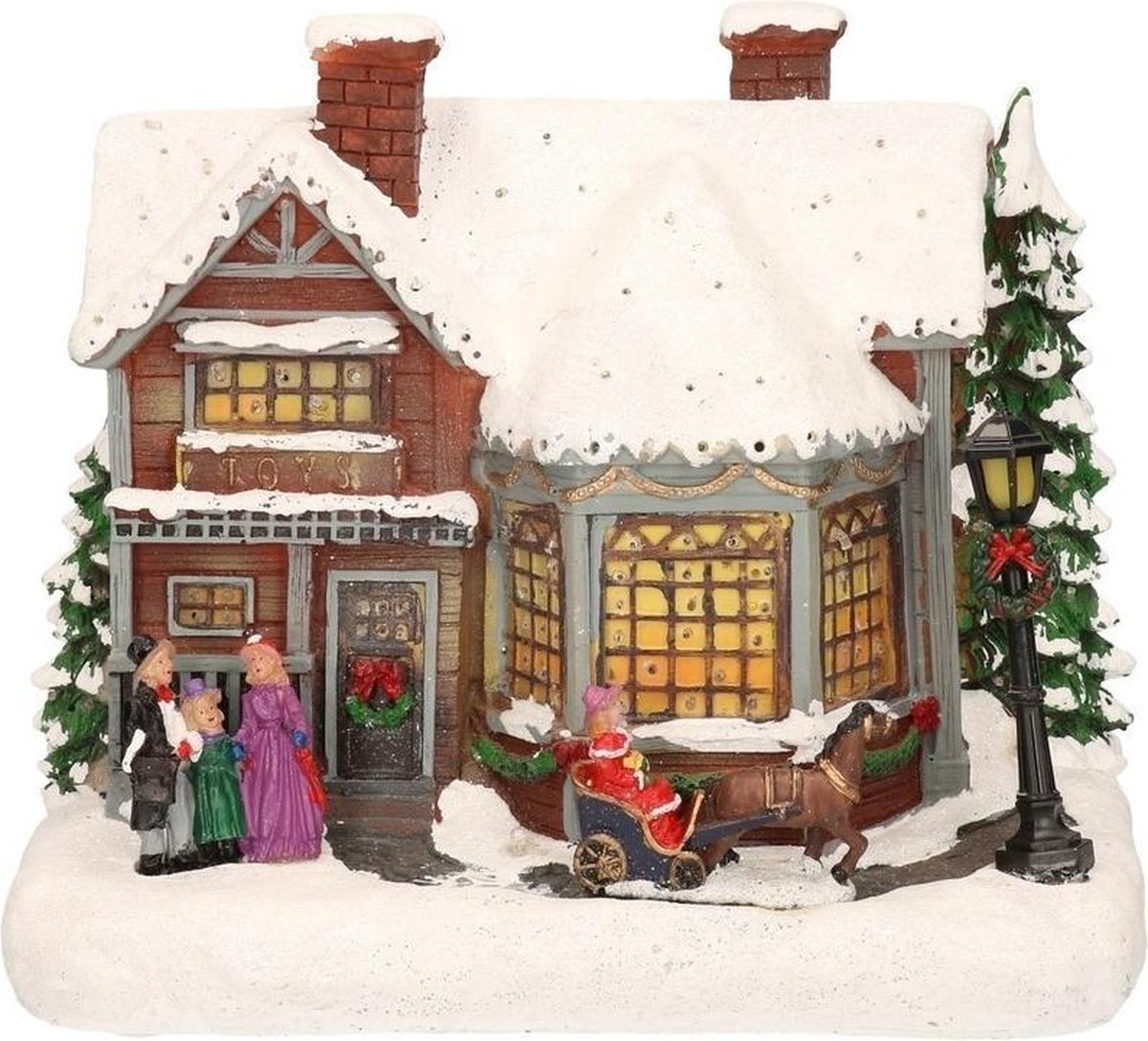 Kerstdorpen bouwen kersthuisjes met zingend gezin en koets 19