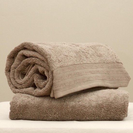 Samenpersen pellet Aannames, aannames. Raad eens Set van twee zeer zachte dikke handdoeken Maui stone 50x100 cm van  Amerikaans Pima katoen | bol.com