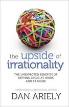 Boek 'The Upside of Irrationality' met een bal van gekleurde elastiekjes.