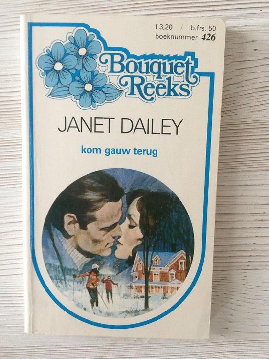 Boek 'Kom gauw terug' van Janet Dailey met een winterse romantische afbeelding van een stel, skiërs en een huis.