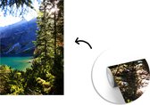 Behang - Fotobehang Het berglandschap en een turquoise meer in het nationaal park Tatra in Polen - Breedte 190 cm x hoogte 280 cm