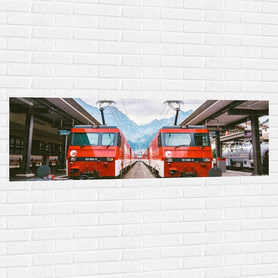 WallClassics - Muursticker - Twee Treinen bij Station - 150x50 cm Foto op Muursticker