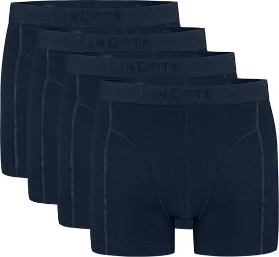 Vier donkerblauwe Ten Cate boxershorts op een rij.