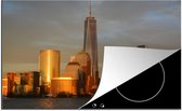 KitchenYeah® Inductie beschermer 77x51 cm - De skyline van New York met het One World Trade Center - Kookplaataccessoires - Afdekplaat voor kookplaat - Inductiebeschermer - Inductiemat - Inductieplaat mat