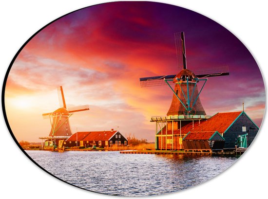 Dibond Ovaal - Nederlandse Windmolens aan het Water onder Paars met Oranje Lucht - 28x21 cm Foto op Ovaal (Met Ophangsysteem)