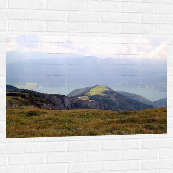Muursticker - Uitzicht over Berglandschap - 105x70 cm Foto op Muursticker