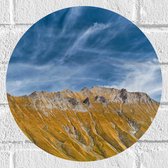 Muursticker Cirkel - Schapen Wolken boven Stijle Berg - 30x30 cm Foto op Muursticker