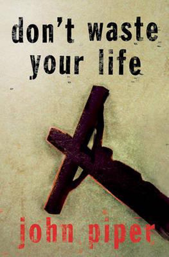 Boek kaft met de tekst "don't waste your life" en "john piper" met een kruis.