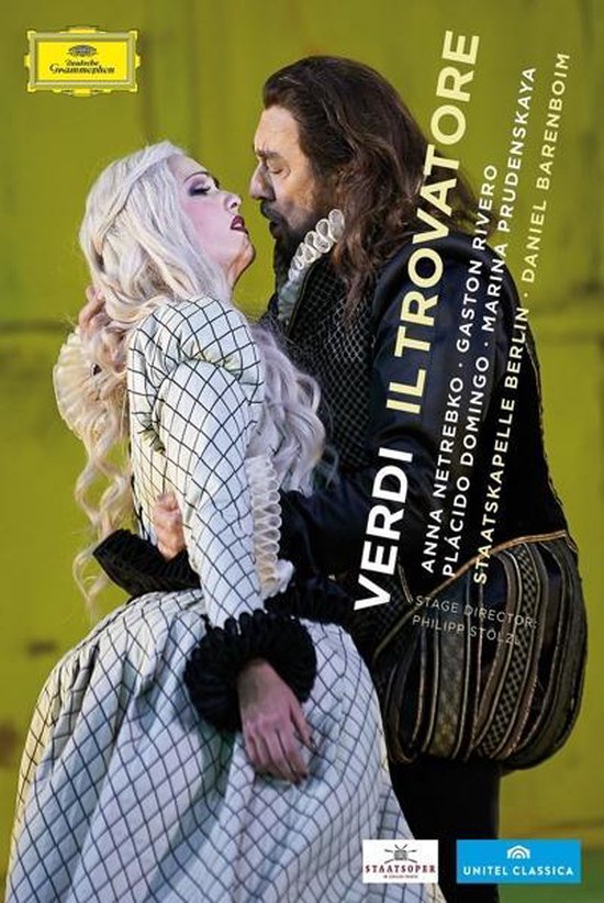 Een man en vrouw in historische kleding, "VERDI IL TROVATORE" staat verticaal op het scherm.