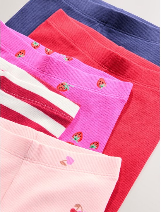 Gevouwen set van vijf geribbelde leggings in marineblauw, rood, roze met aardbeien, gestreept en roze met hartjes.