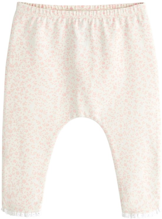 Legging met fijne bloemenprint en kanten randjes aan de onderkant.