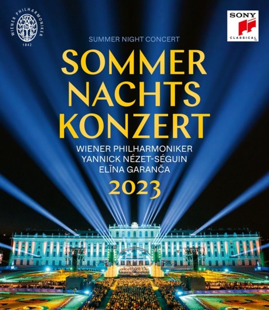Poster van het Zomerconcert 2023 van de Wiener Philharmoniker, met belichting op een paleis en orkest.